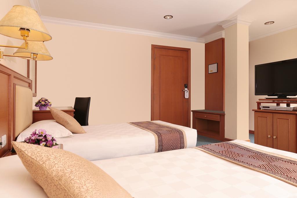 Hotel Sentosa Kuala Belait Habitación foto